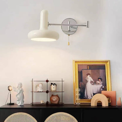 Cream Rocker Arm Round Retractable 1-Light Wall Sconce Lamp