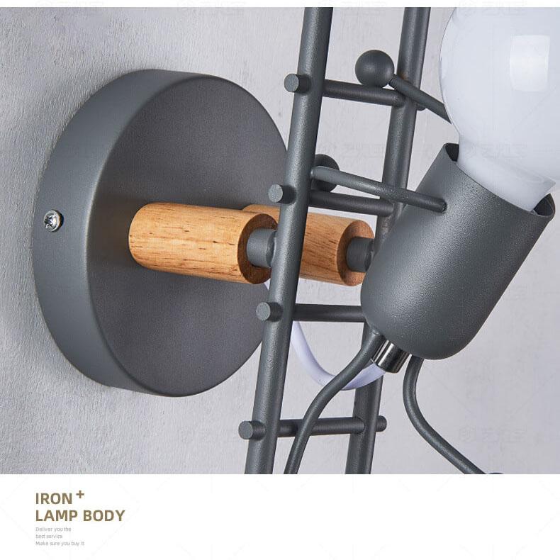 Wrought 1-Light Stair Climbing Villain Robot Sconce Lamp