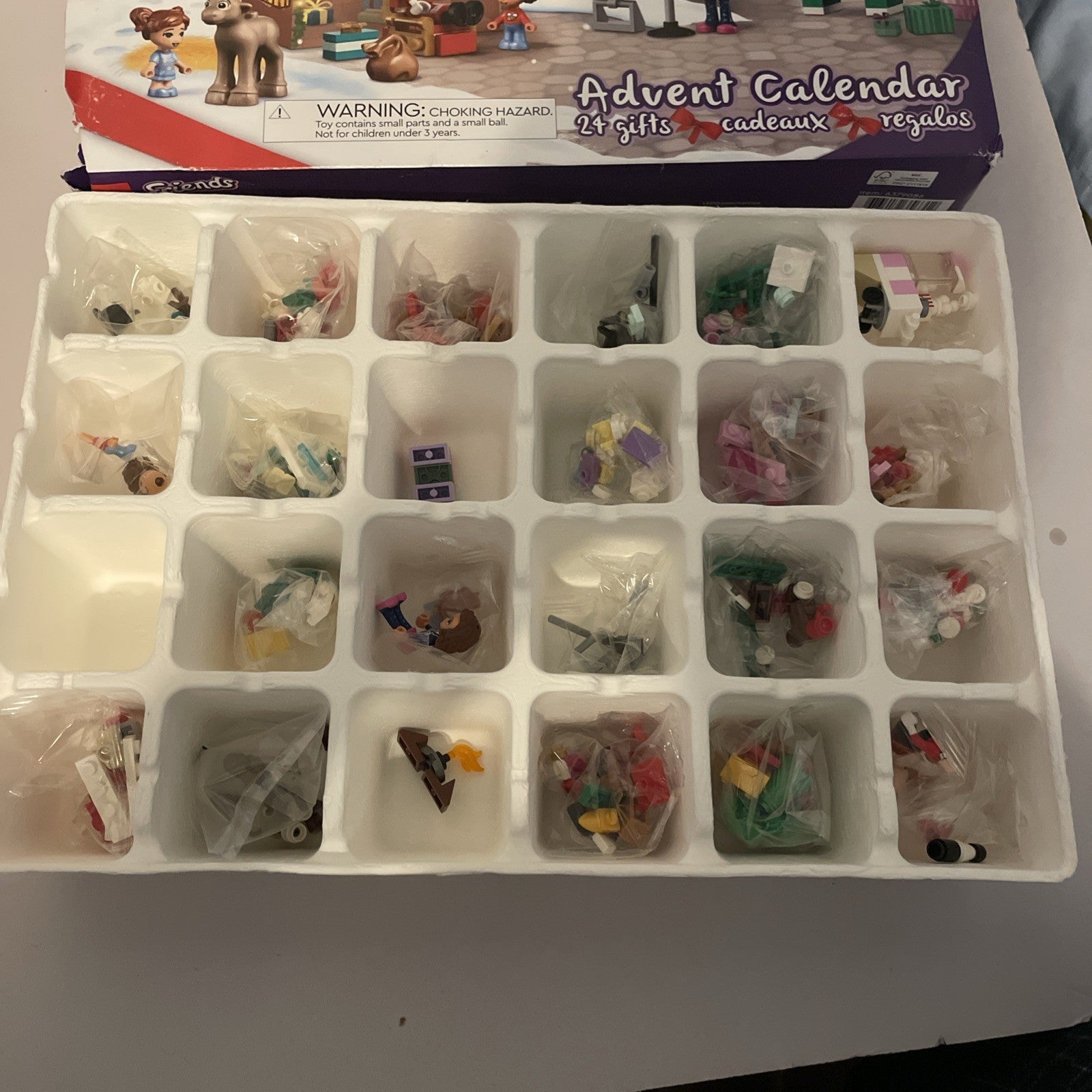 LEGO Friends Advent Calendar 41706 Mostly new in damaged open box